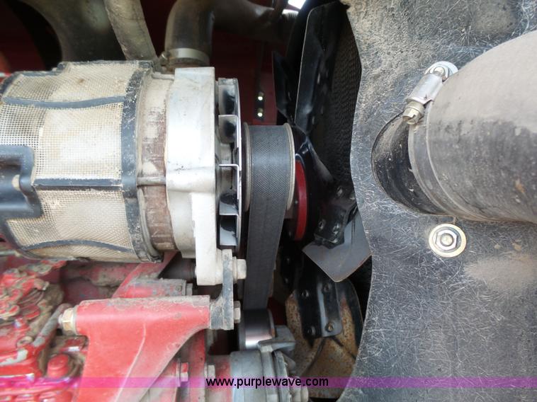 image for item J4935 2003 New Holland HW340 self-propelled windrower