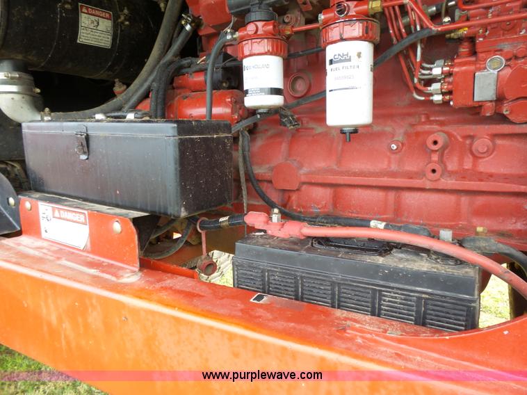 image for item J4935 2003 New Holland HW340 self-propelled windrower