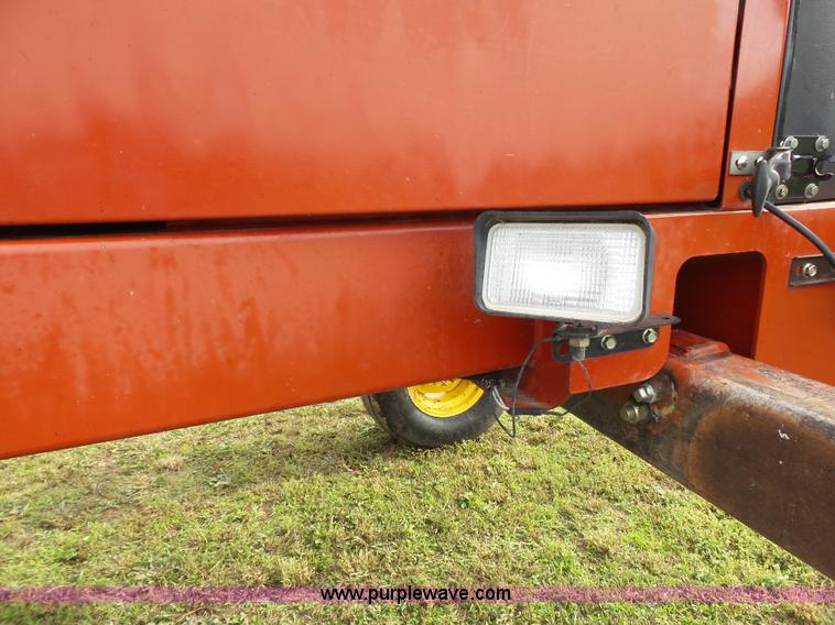 image for item J4935 2003 New Holland HW340 self-propelled windrower