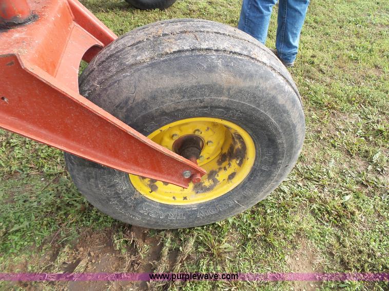 image for item J4935 2003 New Holland HW340 self-propelled windrower