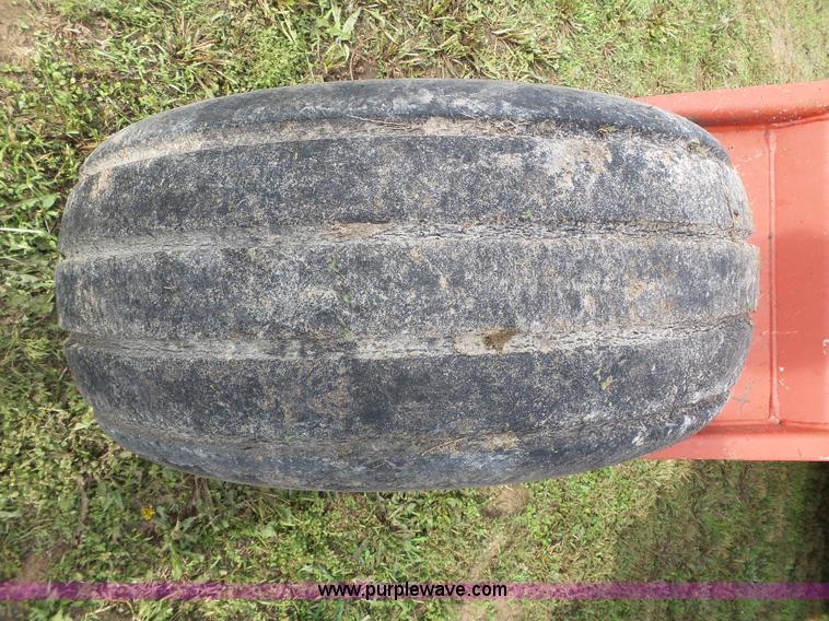 image for item J4935 2003 New Holland HW340 self-propelled windrower