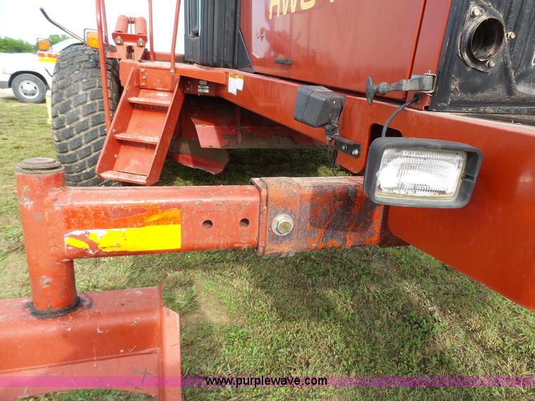 image for item J4935 2003 New Holland HW340 self-propelled windrower