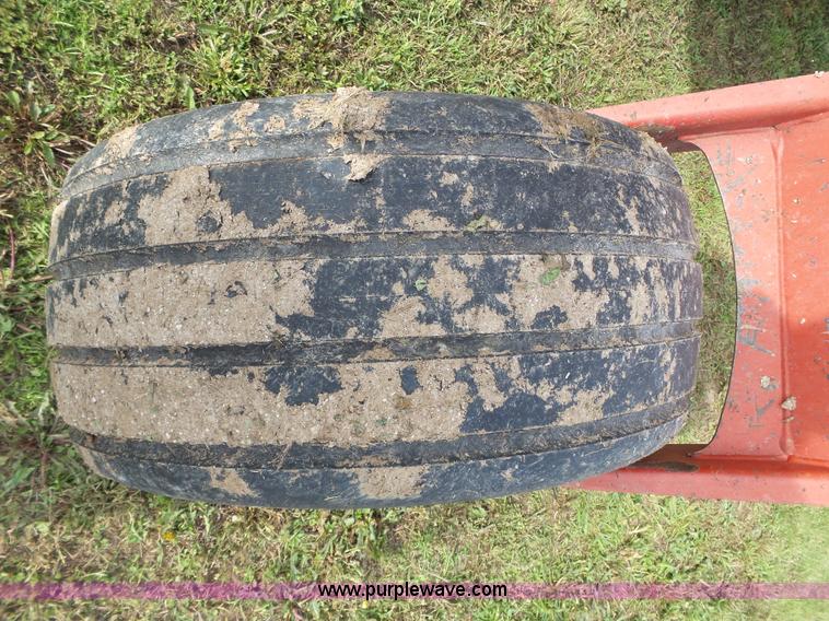 image for item J4935 2003 New Holland HW340 self-propelled windrower