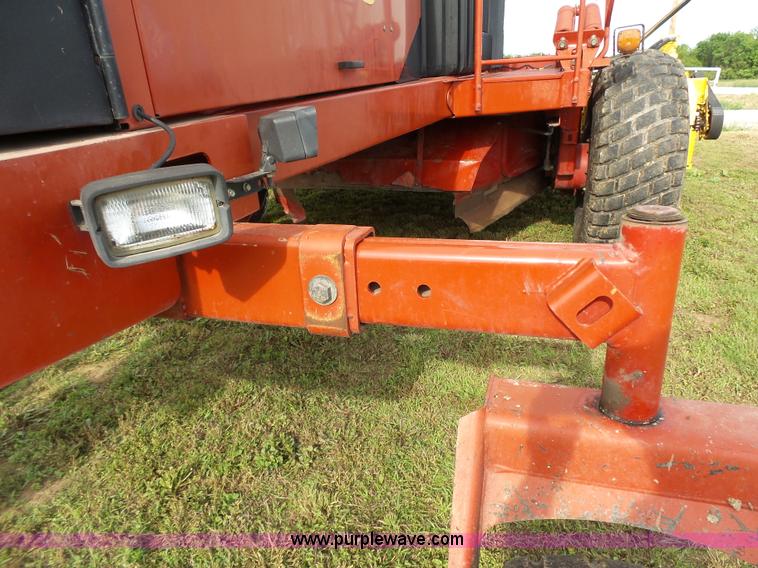 image for item J4935 2003 New Holland HW340 self-propelled windrower