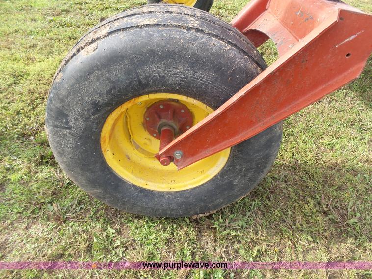 image for item J4935 2003 New Holland HW340 self-propelled windrower