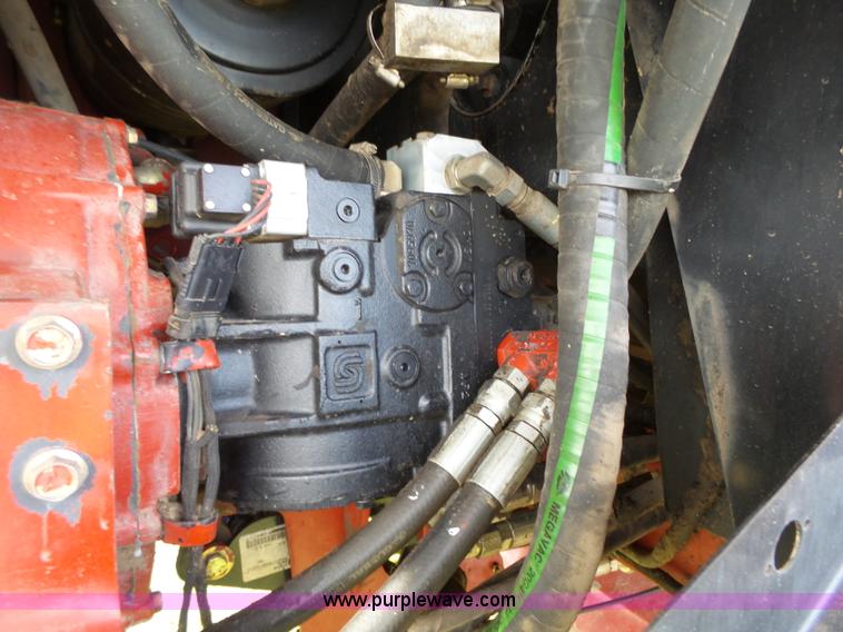 image for item J4935 2003 New Holland HW340 self-propelled windrower