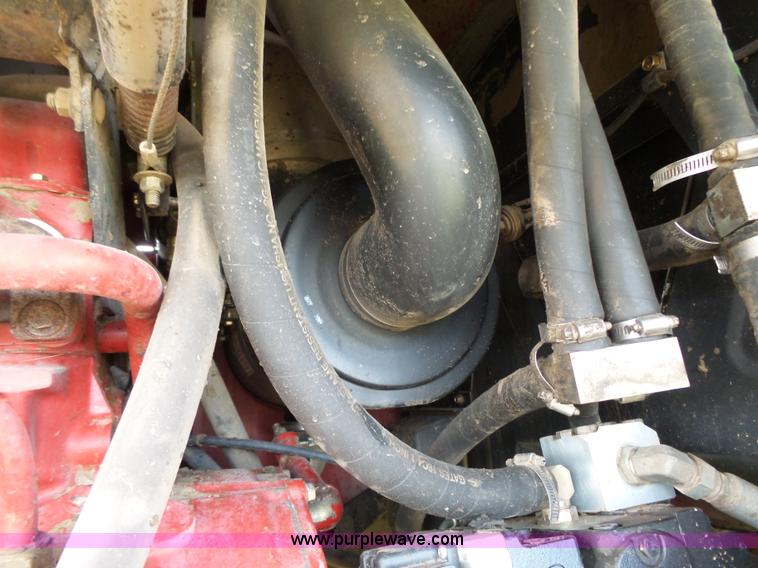 image for item J4935 2003 New Holland HW340 self-propelled windrower