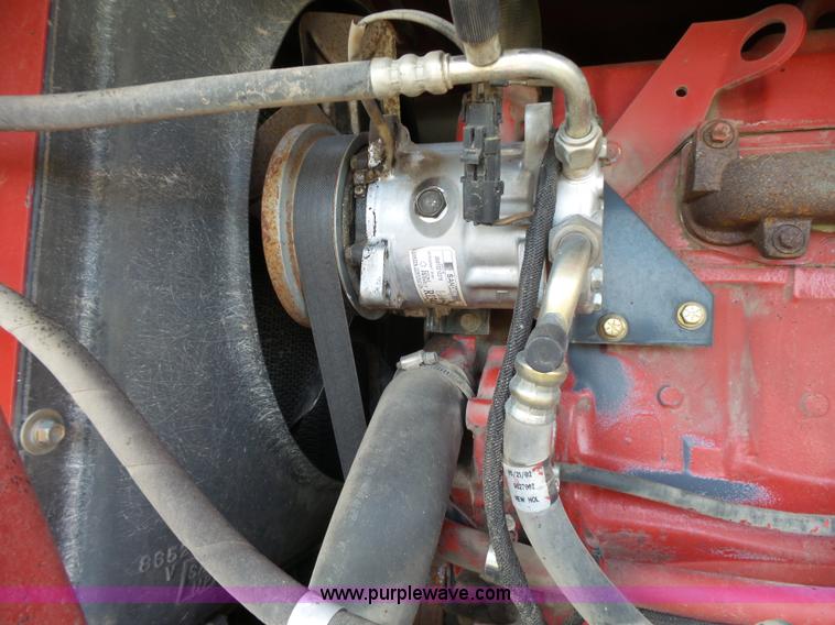 image for item J4935 2003 New Holland HW340 self-propelled windrower