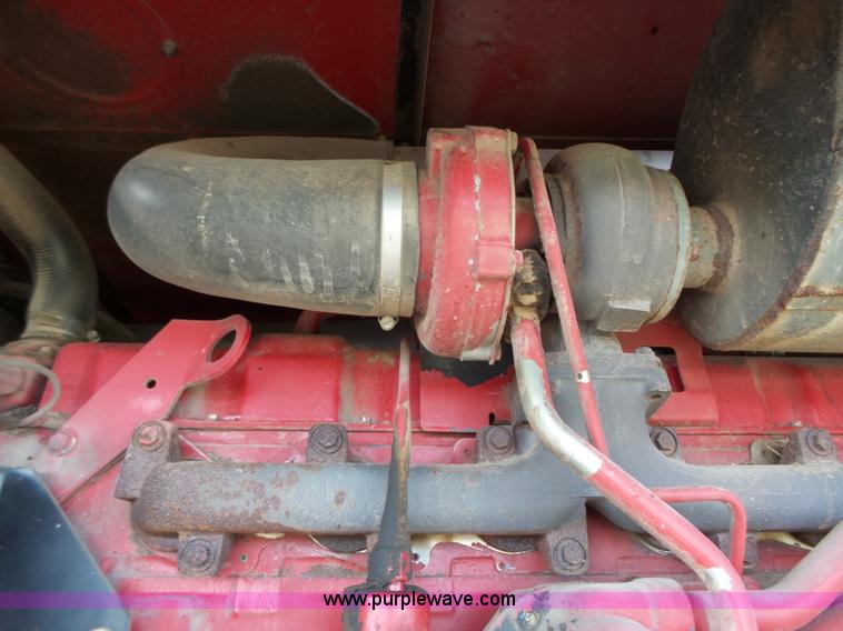 image for item J4935 2003 New Holland HW340 self-propelled windrower