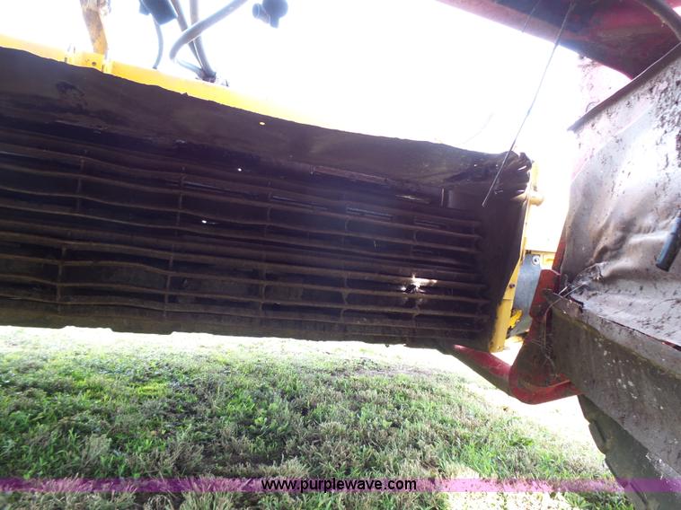 image for item J4935 2003 New Holland HW340 self-propelled windrower