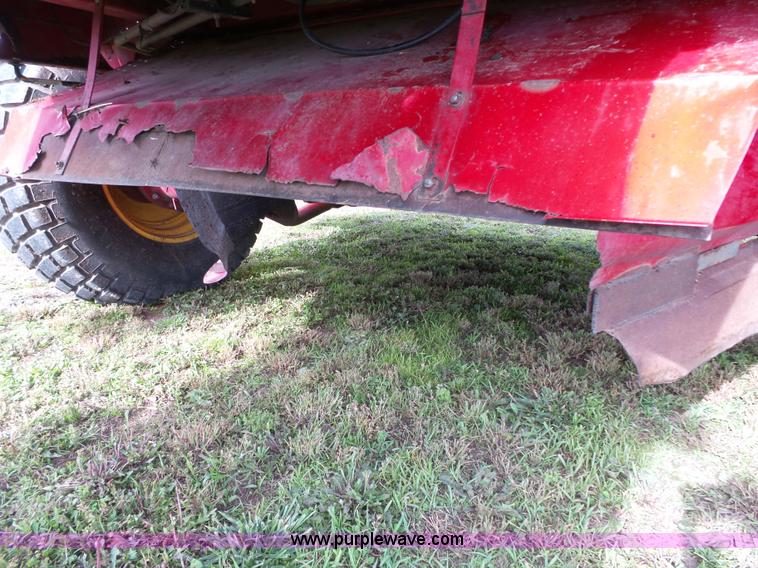 image for item J4935 2003 New Holland HW340 self-propelled windrower