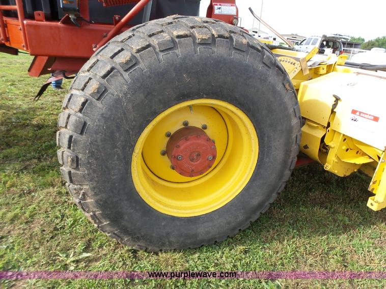 image for item J4935 2003 New Holland HW340 self-propelled windrower