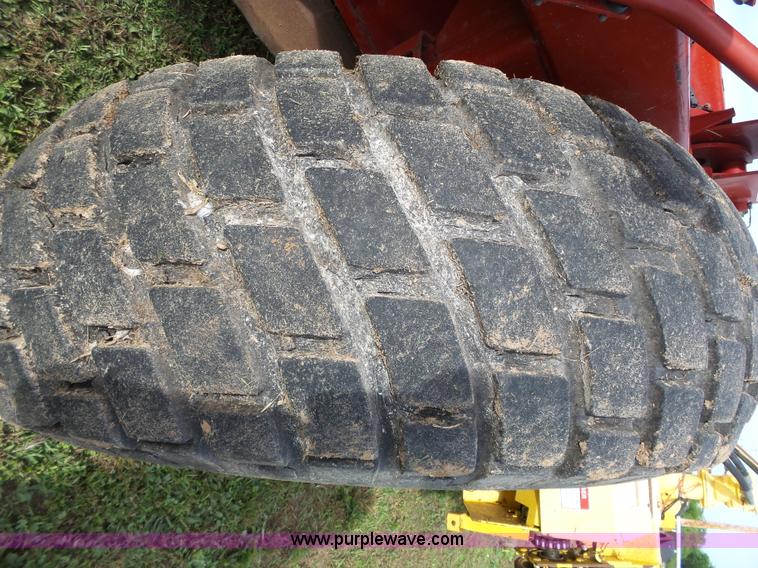 image for item J4935 2003 New Holland HW340 self-propelled windrower