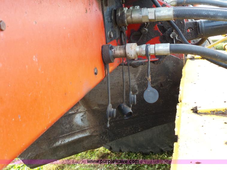 image for item J4935 2003 New Holland HW340 self-propelled windrower