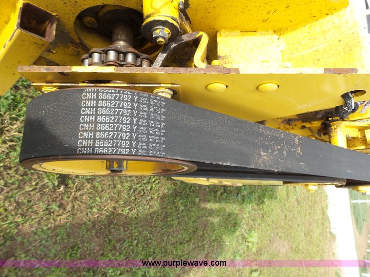 image for item J4935 2003 New Holland HW340 self-propelled windrower