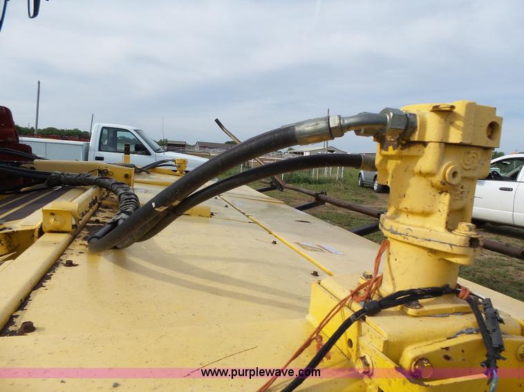 image for item J4935 2003 New Holland HW340 self-propelled windrower