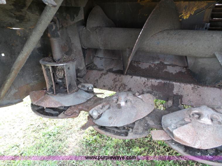 image for item J4935 2003 New Holland HW340 self-propelled windrower