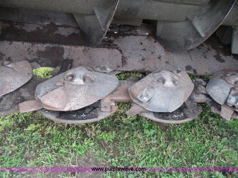 image for item J4935 2003 New Holland HW340 self-propelled windrower