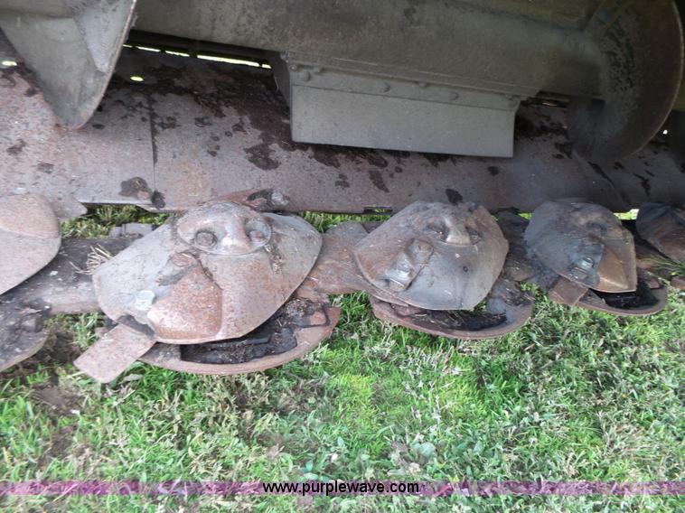 image for item J4935 2003 New Holland HW340 self-propelled windrower