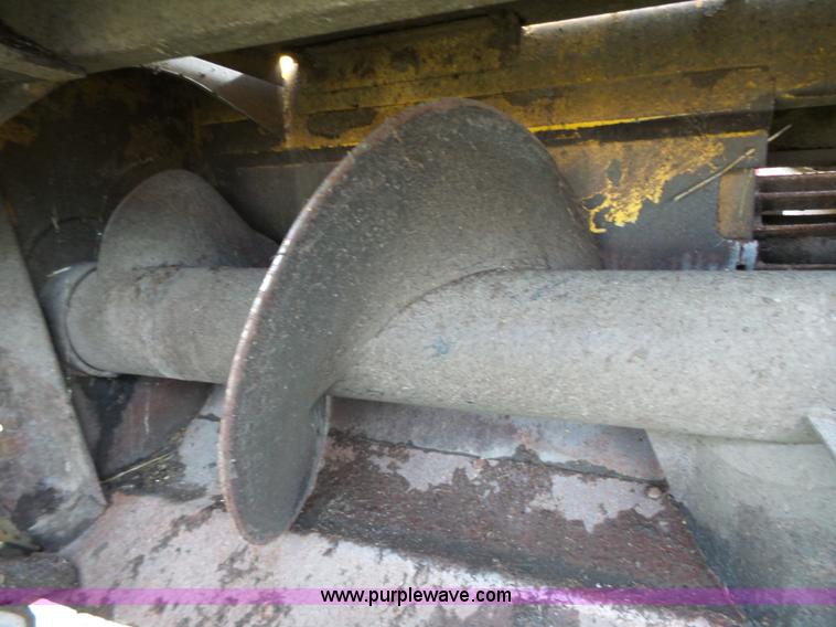 image for item J4935 2003 New Holland HW340 self-propelled windrower