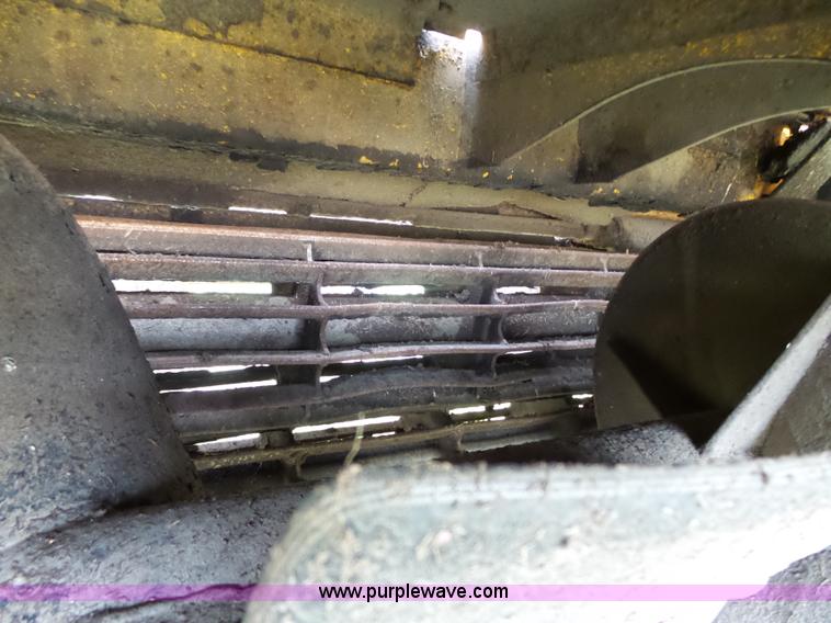 image for item J4935 2003 New Holland HW340 self-propelled windrower