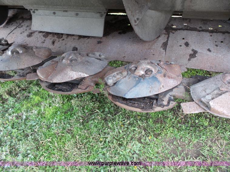 image for item J4935 2003 New Holland HW340 self-propelled windrower