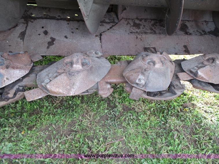 image for item J4935 2003 New Holland HW340 self-propelled windrower