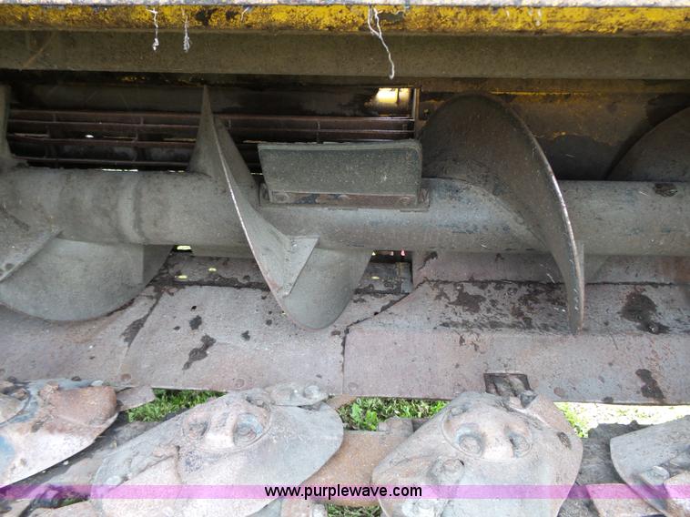 image for item J4935 2003 New Holland HW340 self-propelled windrower