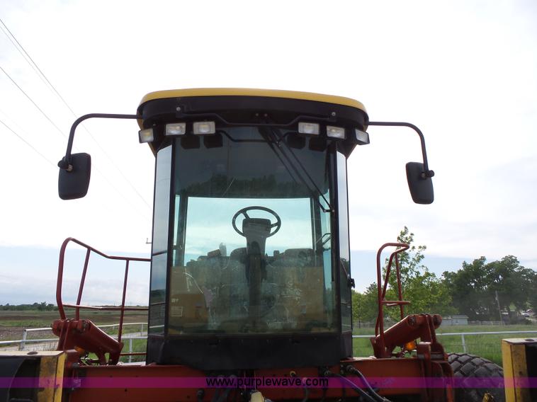 image for item J4935 2003 New Holland HW340 self-propelled windrower