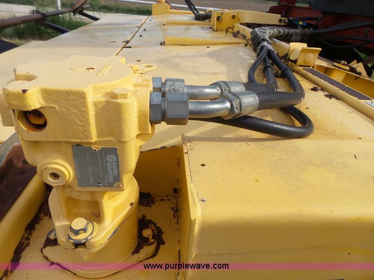 image for item J4935 2003 New Holland HW340 self-propelled windrower