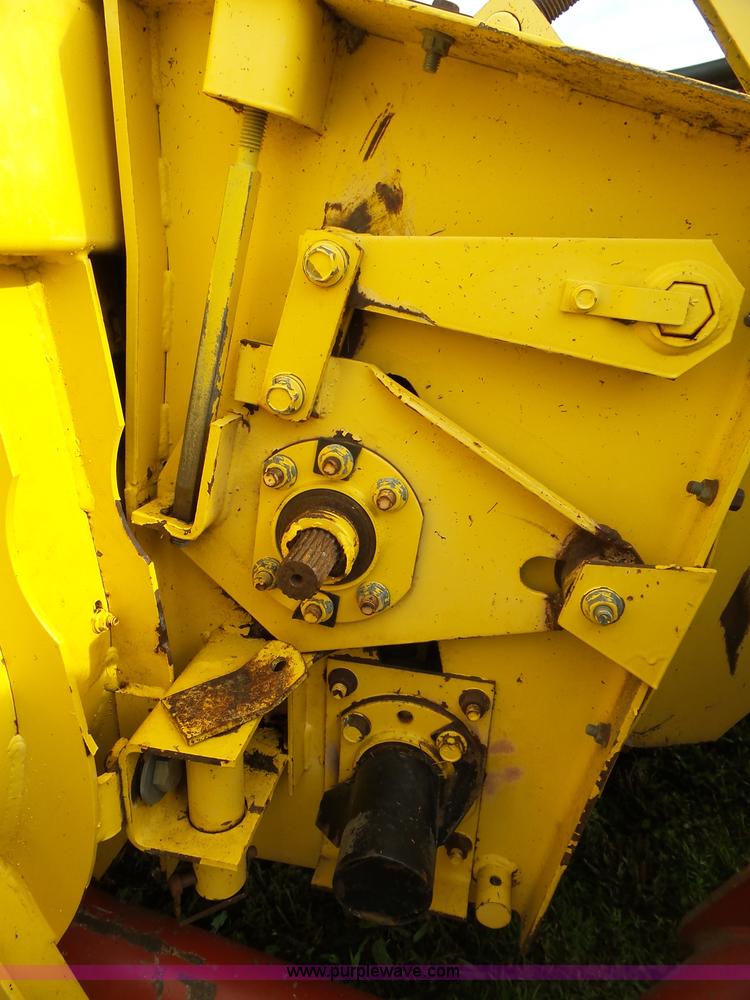 image for item J4935 2003 New Holland HW340 self-propelled windrower