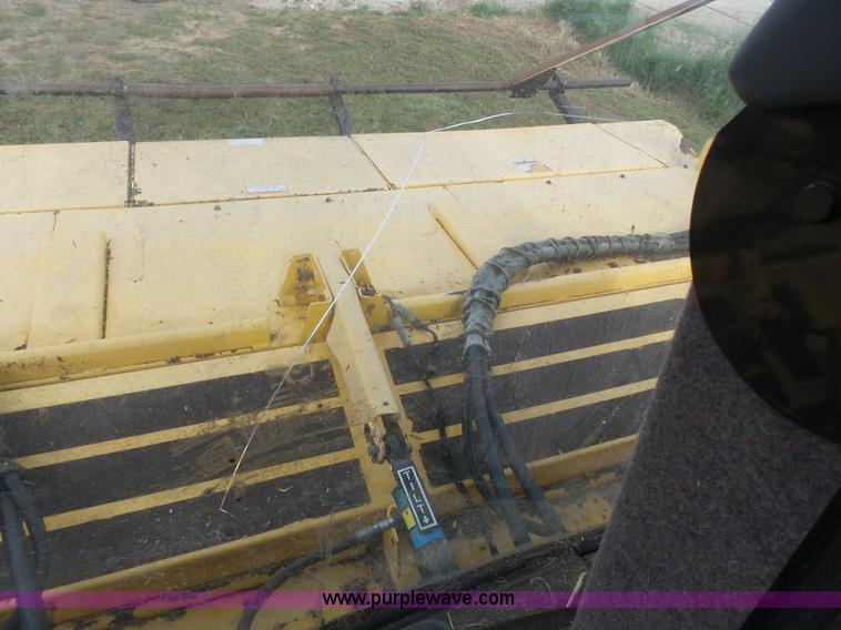 image for item J4935 2003 New Holland HW340 self-propelled windrower