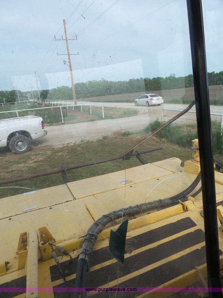 image for item J4935 2003 New Holland HW340 self-propelled windrower