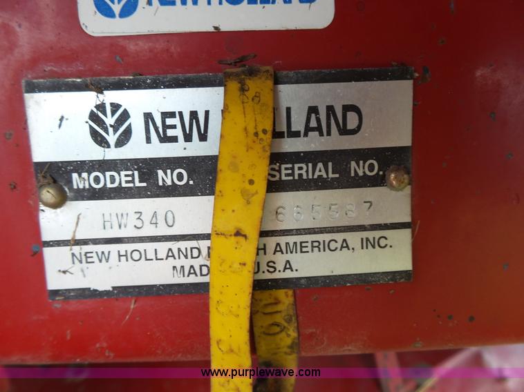 image for item J4935 2003 New Holland HW340 self-propelled windrower
