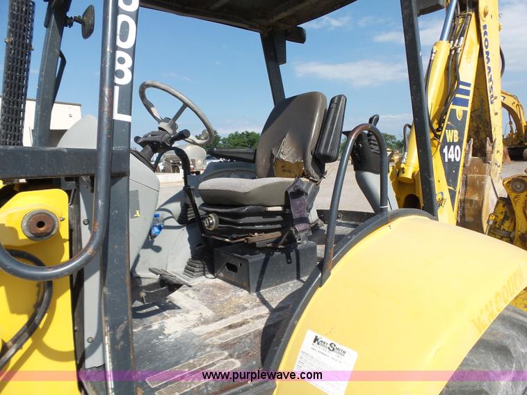 image for item J2793 2004 Komatsu WB140-2N backhoe