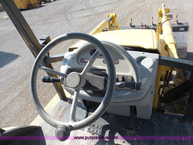 image for item J2793 2004 Komatsu WB140-2N backhoe