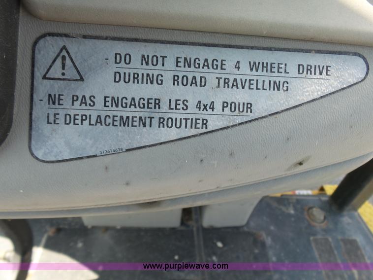 image for item J2793 2004 Komatsu WB140-2N backhoe