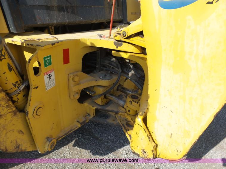 image for item J2793 2004 Komatsu WB140-2N backhoe