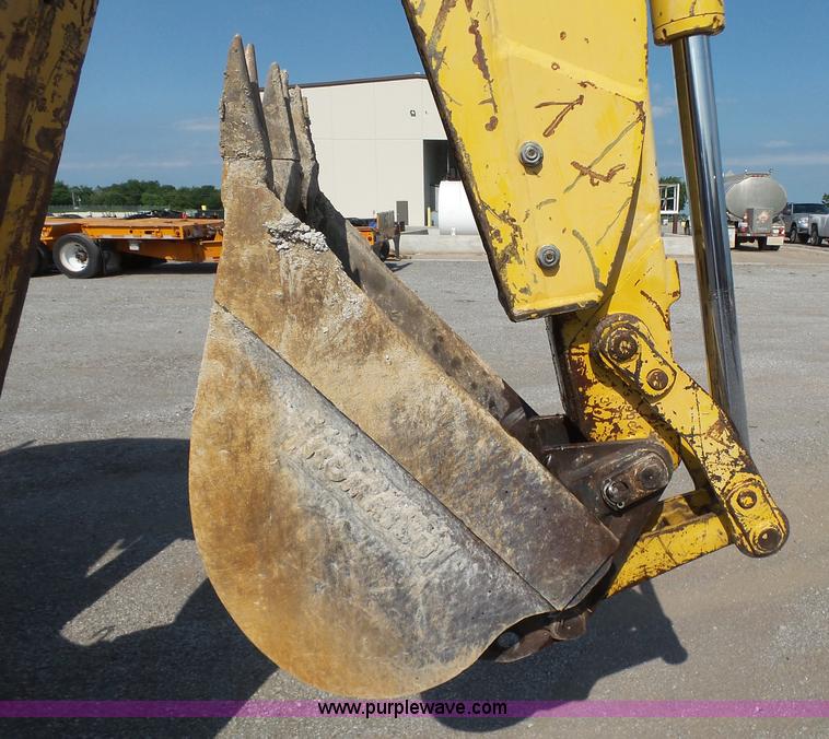 image for item J2793 2004 Komatsu WB140-2N backhoe