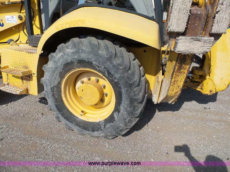 image for item J2793 2004 Komatsu WB140-2N backhoe