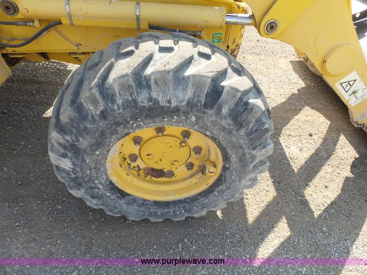image for item J2793 2004 Komatsu WB140-2N backhoe