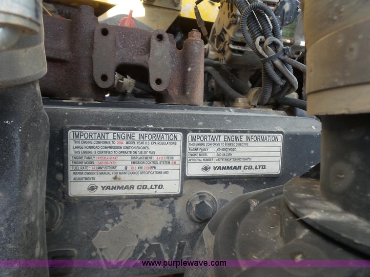 image for item J2793 2004 Komatsu WB140-2N backhoe