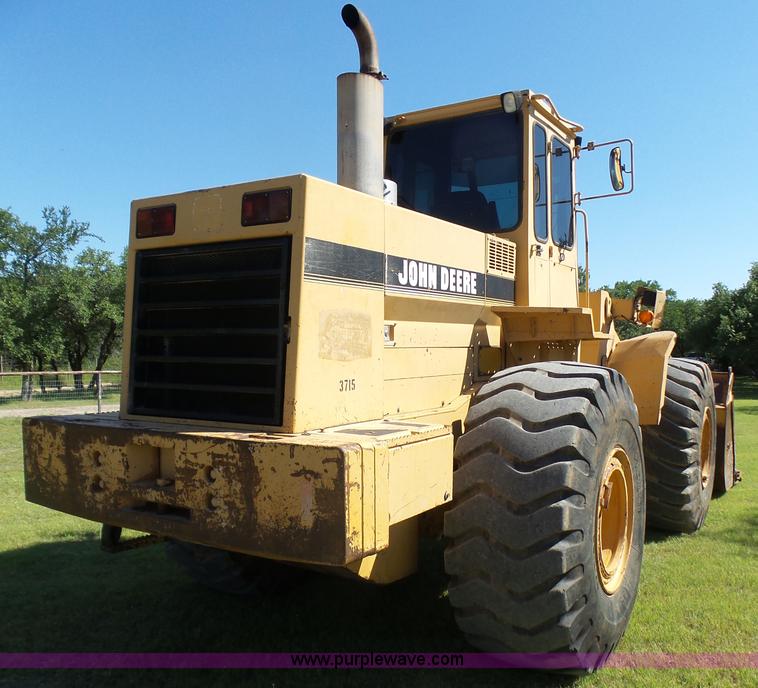 image for item L1537 1996 John Deere 744E wheel loader