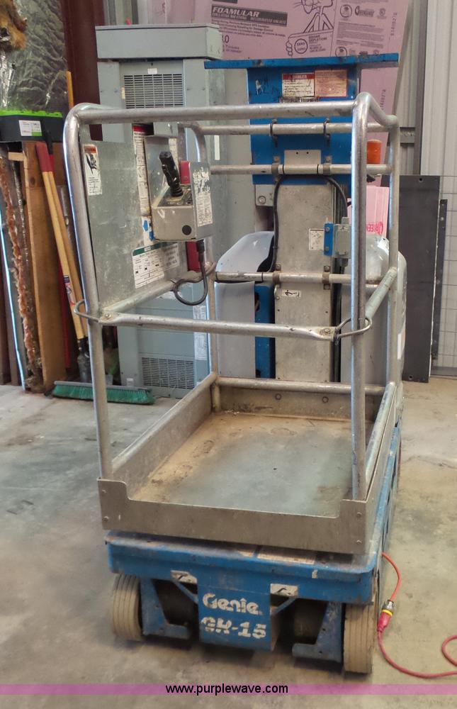 image for item L6064 2005 Genie GR15 scissor lift