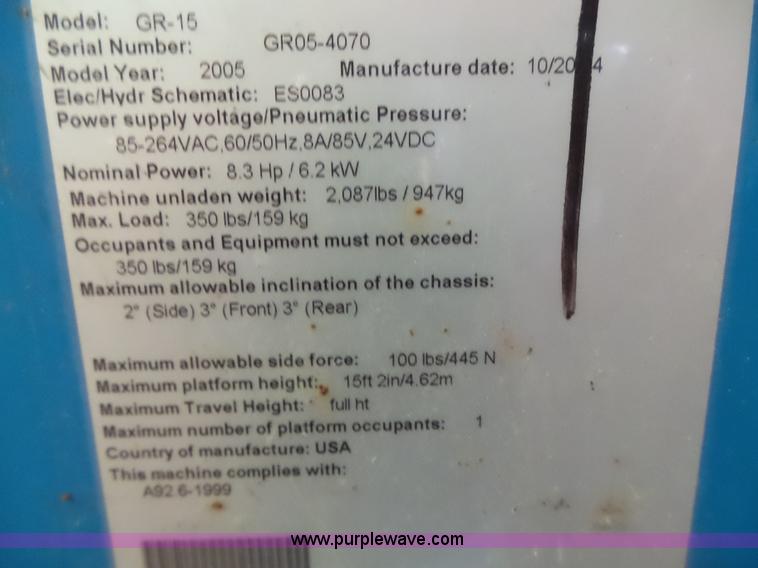 image for item L6064 2005 Genie GR15 scissor lift