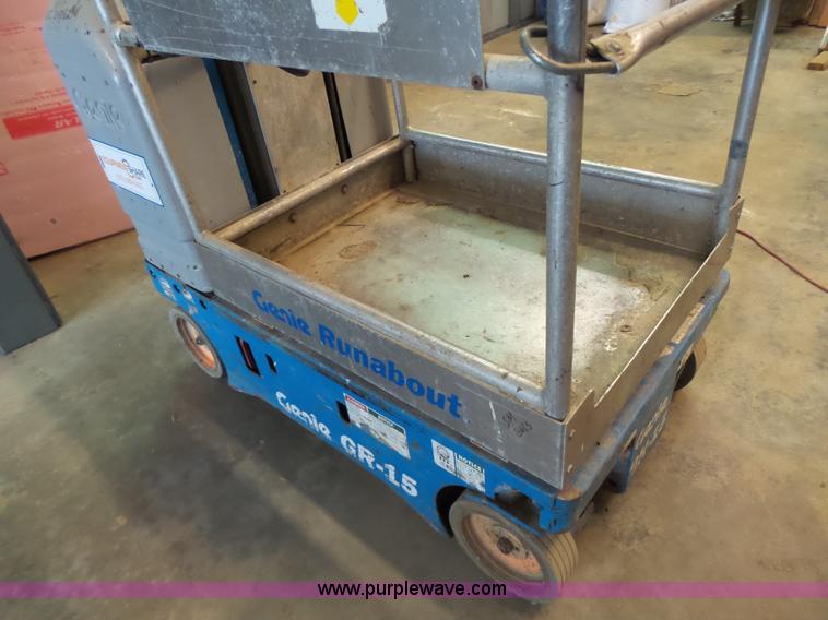 image for item L6064 2005 Genie GR15 scissor lift