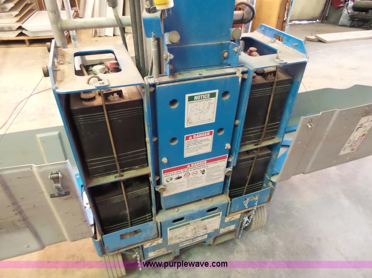 image for item L6064 2005 Genie GR15 scissor lift