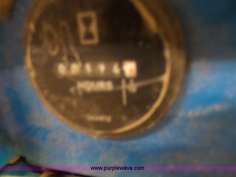 image for item L6064 2005 Genie GR15 scissor lift