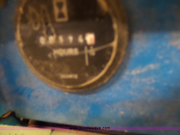 image for item L6064 2005 Genie GR15 scissor lift