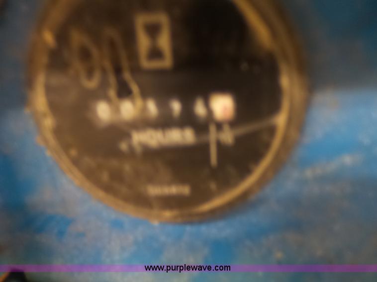 image for item L6064 2005 Genie GR15 scissor lift